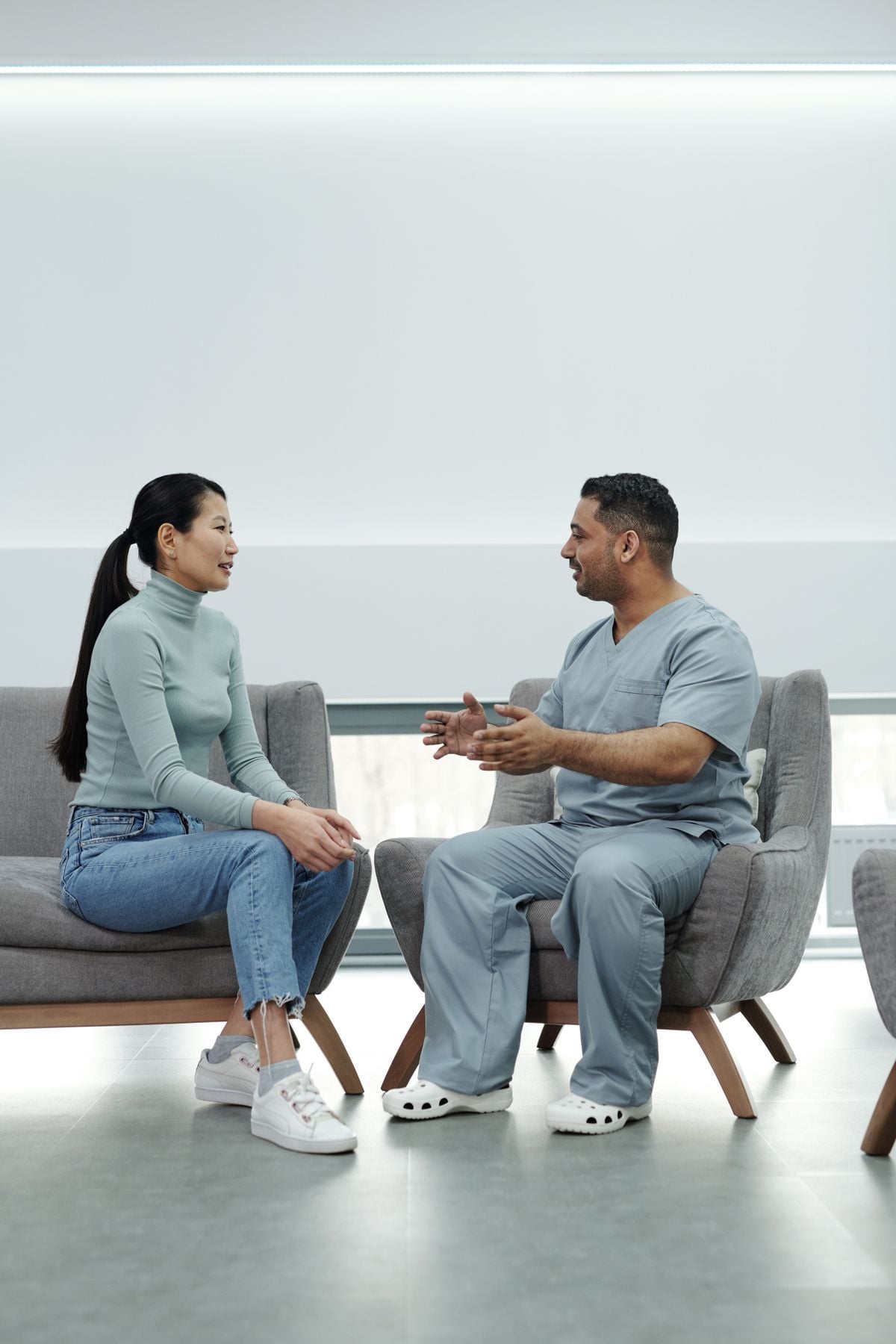 A physician talking with a patient