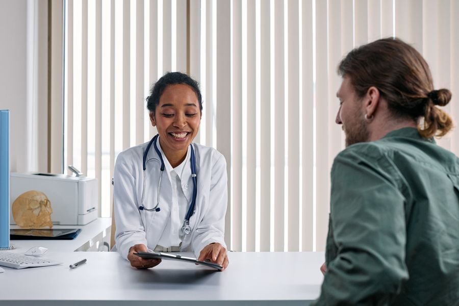 A physician reviewing results with a patient